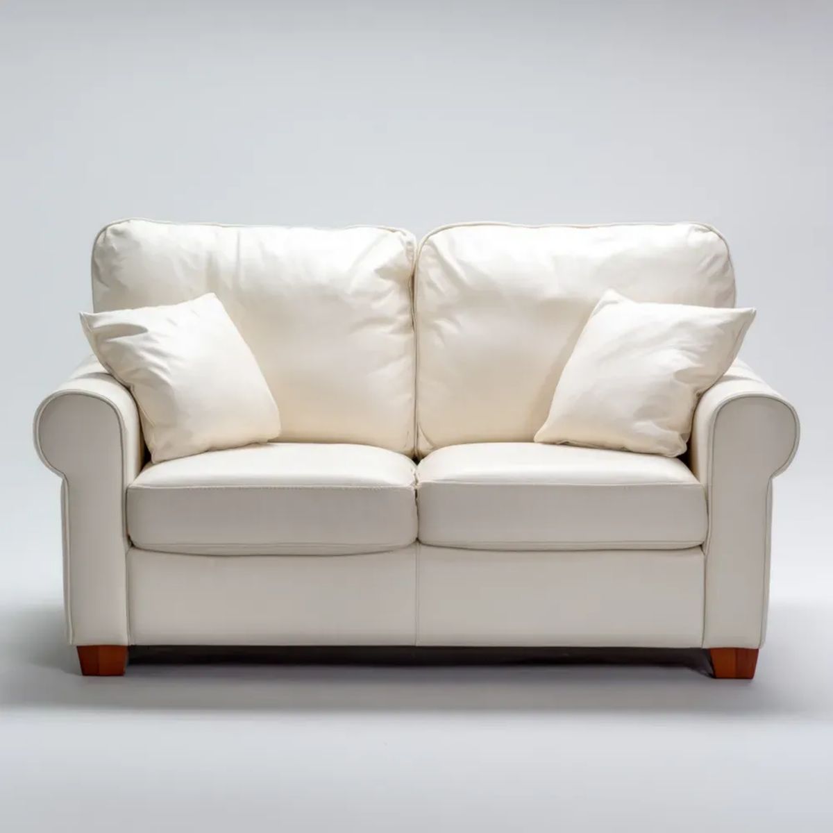 Kremowa sofa dwuosobowa ze skóry PU 160 x 90 x 92 cm z brązowymi nogami